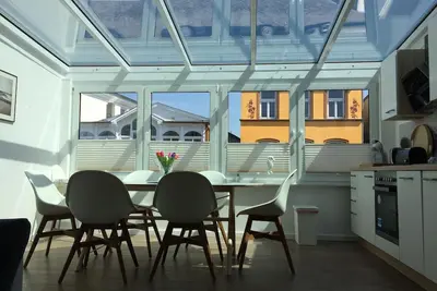 Image de « Voile solaire » Inside out: central comme il se - avec jardin d'hiver