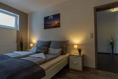 Image de Appartement tout confort avec jardin, terrasse et barbecue. Se sentir bien inclus.
