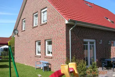 Image de Ferienhaus Seehund sur la cĂ´te est de la Frise orientale avec 3 chambres
