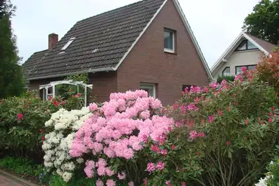 Image de Idyllic house, at historic clinker brick street with linden trees