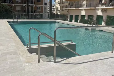 Image de Bel appartement moderne avec piscine communautaire et vue sur la mer