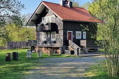 Image de Harzer Wiesenbaude - Maison de vacances avec cheminée, sauna, étang de baignade dans un endroit isolé