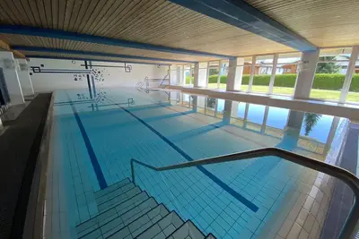 Image de Chalet-appartement à Flims Laax avec balcon, piscine, sauna, jacuzzi, sans fil et Tg
