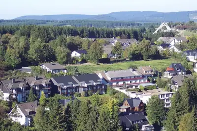 Image de Appartement central à la piste cyclable, au carrousel de ski et à la piste de bobsleigh