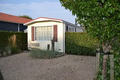Image de Chalet confort situé directement sur la plage dans la Zélande ensoleillée