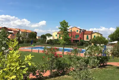 Image de 3-Zi. Appartement avec jardin, Lignano / Aprilia Marittima, piscine, air conditionné, chien admis