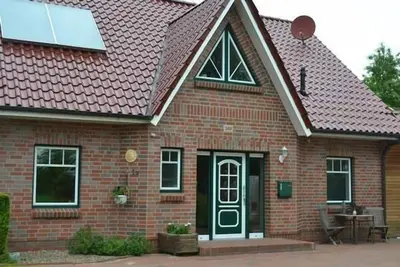 Image de Maison de vacances Neugarmssiel pour 1 - 8 personnes avec 4 chambres à coucher - Maison de vacances