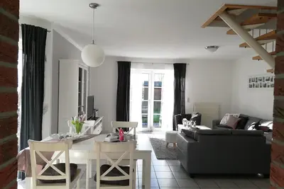 Image de adapté aux allergies moderne. Maison de vacances incl. Chaise de plage en Nessmersiel