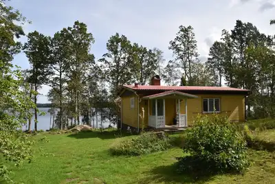 Image de Maison au bord du lac, idéale pour pêcheurs, kayakistes, randonneurs, cyclistes