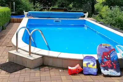 Image de Appartement Suisse saxonne avec balcon, cheminée, jardin, piscine