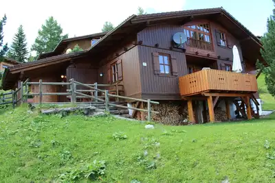Image de Maison en bois à 1800 m avec sauna et poêle en fonte