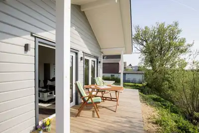 Image de Maison de vacances avec vue panoramique: Perle grise - au milieu de la mer du Nord