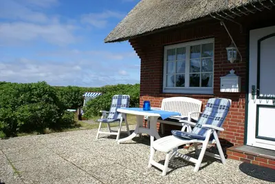 Image de Partie de maison Ă herrl. Paysage de dunes (Kampen) -gr. Terrasse-2 salles de bain-2 chambres