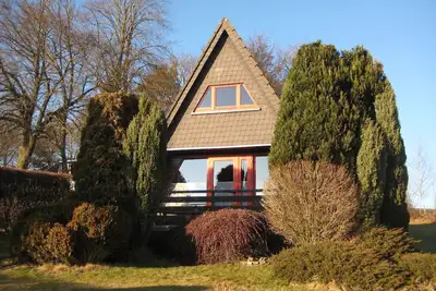 Image de Maison sauvage, confortable maison en bois, 850 m² clôturée pour votre chien.