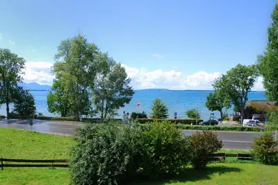 Image de 145 m² directly on the \"Bavarian Sea\" with spectacular lake and mountain views