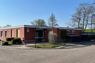 Image de Dornumersiel - Maison pour 6 personnes, 3 chambres, 2 salles de bain, sauna, directement sur la digue