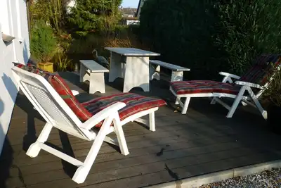 Image de Aux portes de Hambourg, proche de la ville, facilement accessible, grande terrasse, WiFi jardin étang,