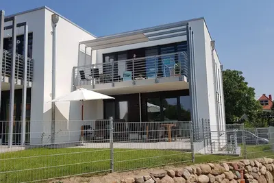 Image de Top appartement sur Rügen avec vue sur l'eau et de superbes vues sur Stralsund.