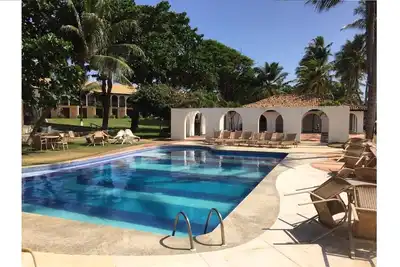 Image de Appartement en bord de mer avec 3 chambres et dans le village principal de Praia do Forte