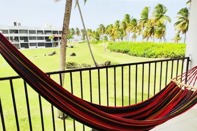 Image de Front de mer et 3 niveaux et terrasse et balcon et 2 piscines jusqu'à 8 personnes!