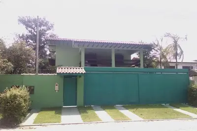 Image de Maison confortable avec quatre suites avec piscine et espace de loisirs, à 200 mètres de la plage