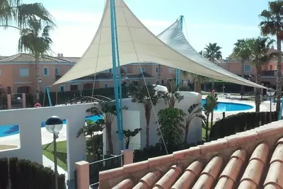 Image de Maison de ville de deux chambres à distance de marche de la plage