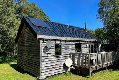 Image de Charmante cabane en rondins bien équipée avec bain à remous
