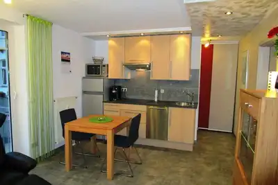 Image de Appartement confort avec chaise de plage, balcon + parking souterrain pour 2 personnes
