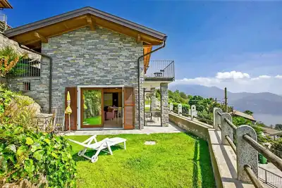 Image de Maison individuelle 3 chambres au Tessin Rusticostil avec vue imprenable sur le lac