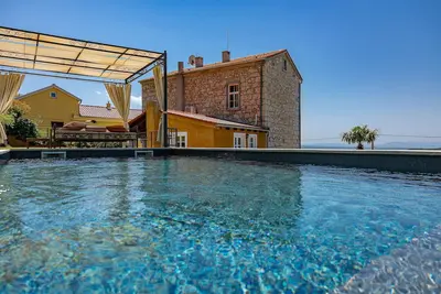 Image de Une maison de vacances avec une touche de luxe pour des vacances inoubliables