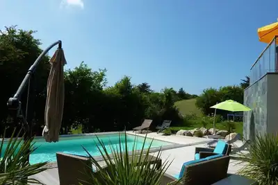 Image de Superbe Villa à 600m de la plage, piscine chauffée couverte, sauna finlandais