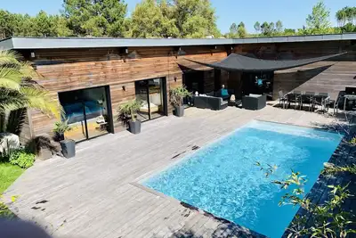 Image de Villa luxueuse, moderne, 10 p. , Clim, Pisc chauffée, Vélos à dispo, pr. plage/golf