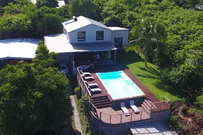 Villa avec piscine chauffée, vue panoramique sur l'océan, à 400 m du lagon