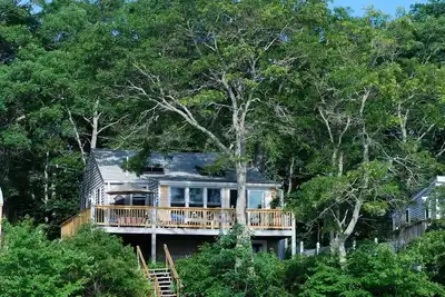 Image de Bord de l'eau chalet sur le lac privé avec Dock