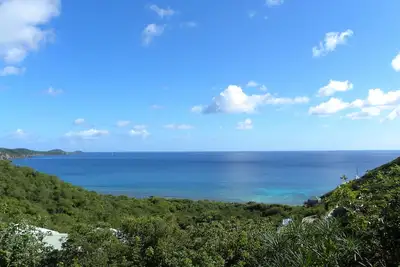 Image de Cottage Reef Bay - vue imprenable sur l'eau