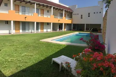 Image de Residencia con JardĂn y Alberca, Capacidad 41 huĂ©spedes / 10 habitaciones con baño