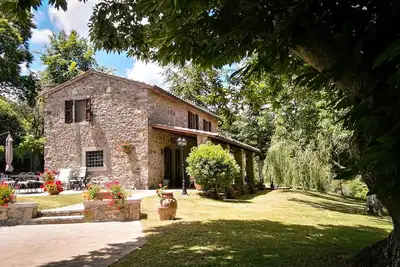 Image de Ferme toscane en pierre avec piscine privée