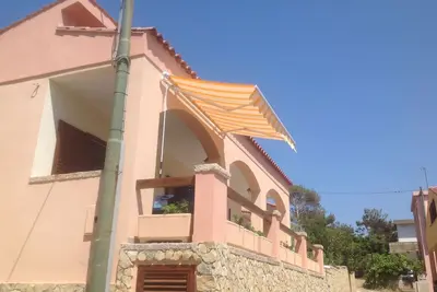 Image de Casa Valentina (Loc. Porto Palma) avec véranda et jardin, au mt. 150 de la plage