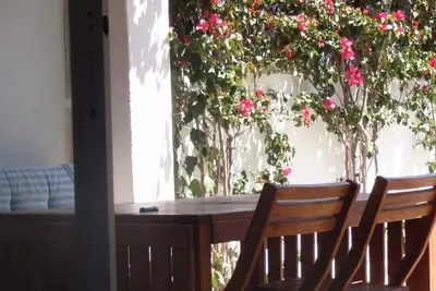 Image de Maison mitoyenne avec son propre jardin plein sud, près de la plage