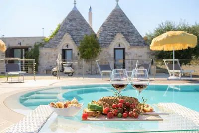 Image de Trullo de luxe, Piscine privée, Climatisation, WiFi, Court de tennis privé, Four à pizza
