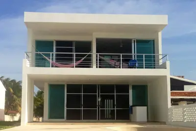 Image de Beach House Mango. Beach Front, Ocean View, Wifi, Tv satellite.