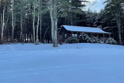 Image de Log Cabin ambiance avec les commodités d'aujourd'hui donne sur 400 acres privé, vue