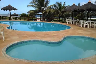 Image de Appartement Camaçari - suite - piscine - Wave Beach - Beira Mar