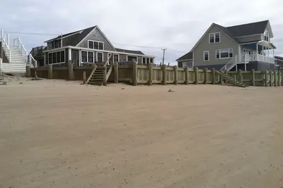 Image de Charme Waterview Cottage sur la plage privée. Spectaculaires couchers de soleil!