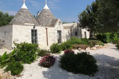 Image de Superbe trullo d'une chambre avec piscine privée et WiFi à la campagne