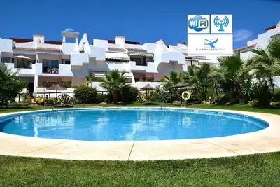 Image de Relax, plage, golf. . . ! ! Penthouse luxe 30 m2 dans une urbanisation privée, Wifi.