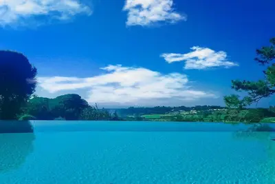 Image de Superbe villa! Salle de jeux, piscine chauffée, climatisation, vue sur l'océan