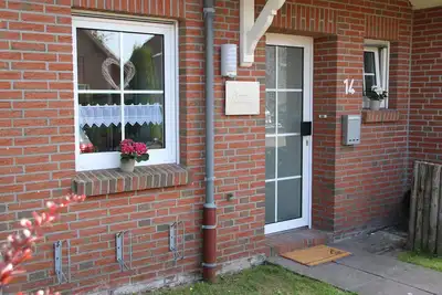 Image de Maison de vacances récemment rénovée - loisirs à \"AnnAHuuS\" à Nessmersiel. Wlan incl.