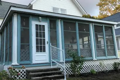 Image de Cottage historique par Holland State Park et le lac Michigan