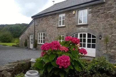 Image de Mill Cottage - un chalet rural confortable avec lac de pêche privé